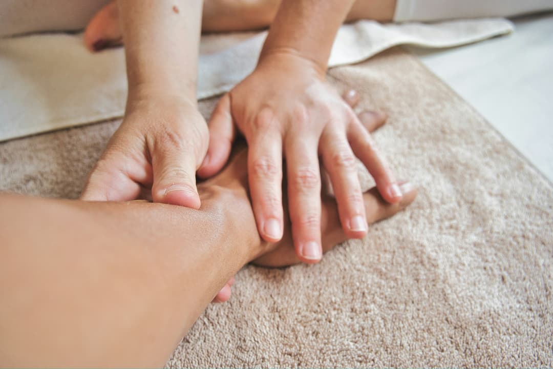 picture of a person receiving a hand massage